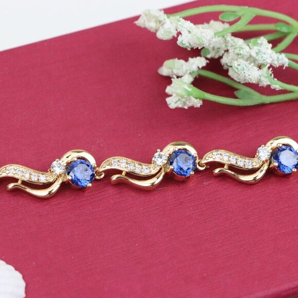 "Elegant Rose Gold Bracelet with Sapphire Blue and Crystal Accents, XPBL0804 - Picture 1 of 12